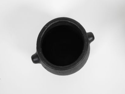 Set including :
- Black-glazed ceramic pitcher,...