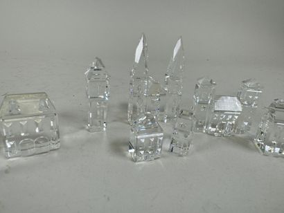SWAROVSKI.
Set of 8 small crystal buildings.
Size...