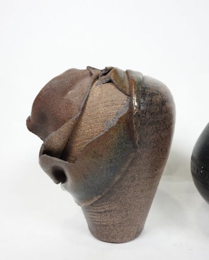 Set including :
- Black-glazed ceramic pitcher,...