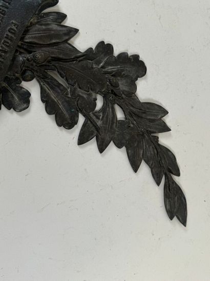 Decorative bronze sconce in the form of foliage...