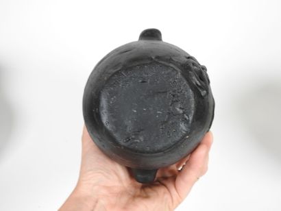 Set including :
- Black-glazed ceramic pitcher,...