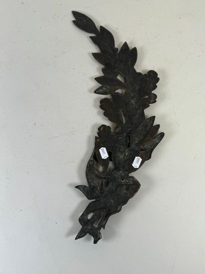 Decorative bronze sconce in the form of foliage...