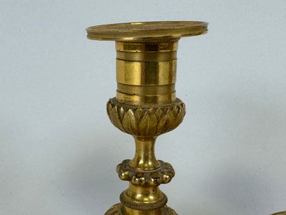 Pair of small torches in chased and gilded...