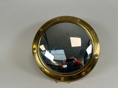 Circular witch mirror in brass, boat style.
20th...