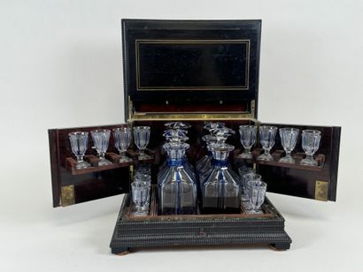 Liqueur cellar in blackened wood and brass...