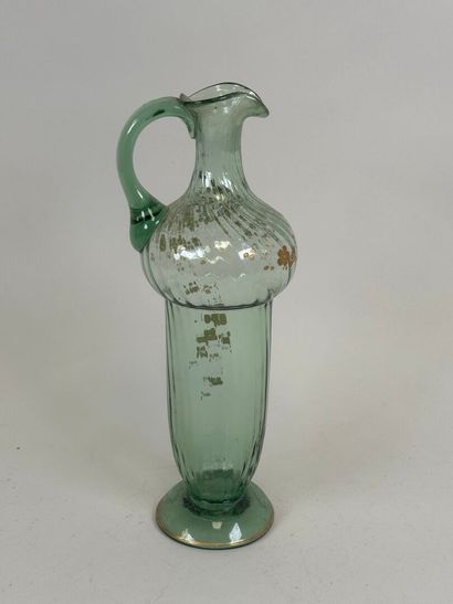 Blown and colored glass pitcher, with gold...