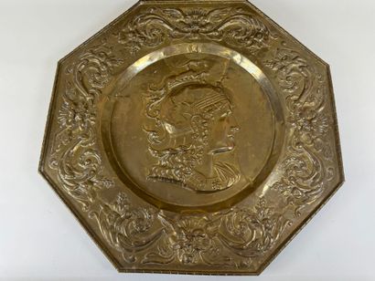 Pair of octagonal repoussé brass dishes with...