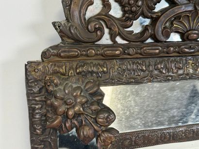 Small repoussé metal mirror with foliate...