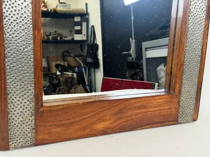 Rectangular mirror in stained wood, the sides...