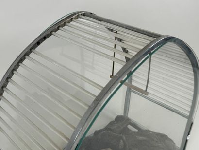 Small cage in chromed metal and glass.
34...