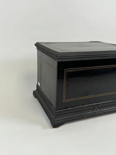 Liqueur cellar in blackened wood and brass...