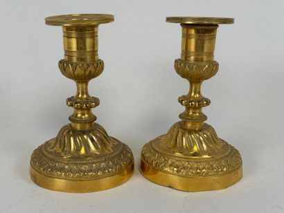 Pair of small torches in chased and gilded...