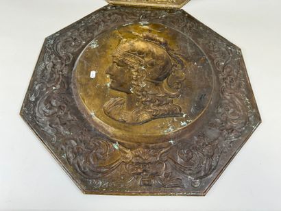 Pair of octagonal repoussé brass dishes with...