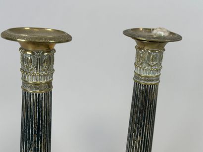 Lot including :
- A pair of ormolu and chased...