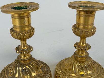 Pair of small torches in chased and gilded...