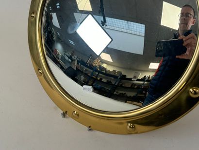 Circular witch mirror in brass, boat style.
20th...