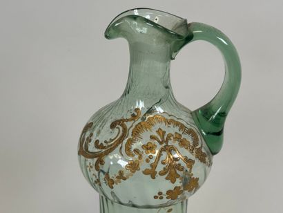 Blown and colored glass pitcher, with gold...