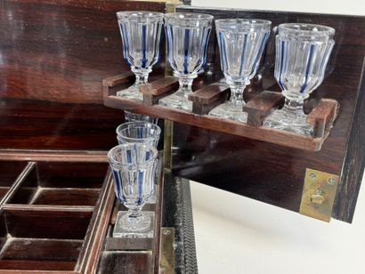 Liqueur cellar in blackened wood and brass...