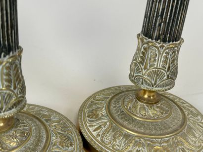 Lot including :
- A pair of ormolu and chased...