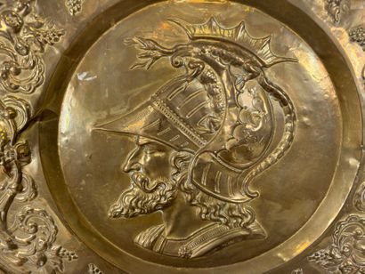 Pair of octagonal repoussé brass dishes with...
