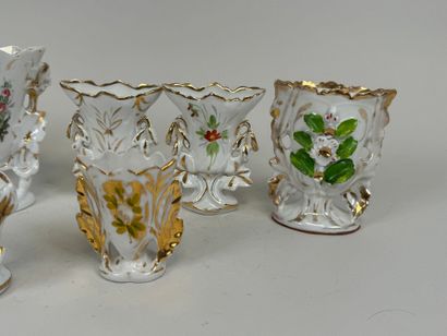 Collection of seven polychrome porcelain...