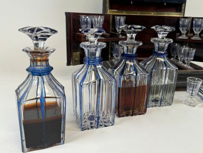Liqueur cellar in blackened wood and brass...
