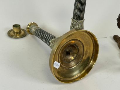 Lot including :
- A pair of ormolu and chased...