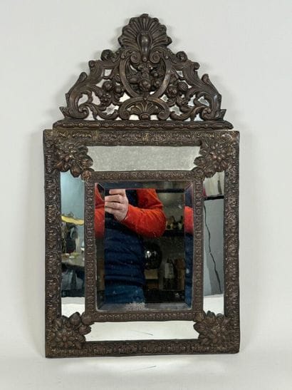 Small repoussé metal mirror with foliate...