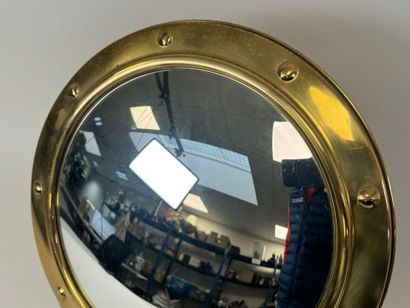 Circular witch mirror in brass, boat style.
20th...