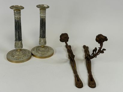 Lot including :
- A pair of ormolu and chased...