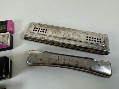 HOHNER - LIGNATONE-
Four harmonicas, two...
