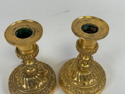 Pair of small torches in chased and gilded...