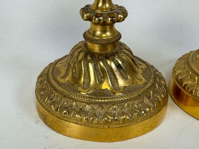 Pair of small torches in chased and gilded...