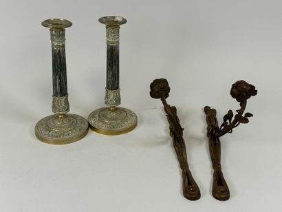 Lot including :
- A pair of ormolu and chased...