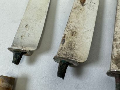 Six ivory knives, silver blades, Minerve...