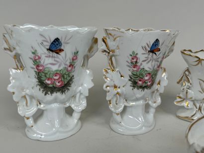 Collection of seven polychrome porcelain...