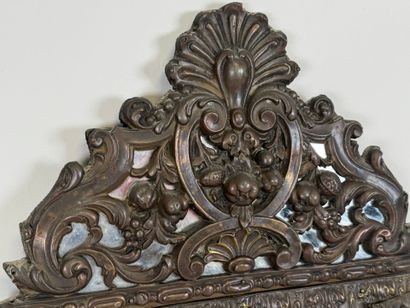 Small repoussé metal mirror with foliate...