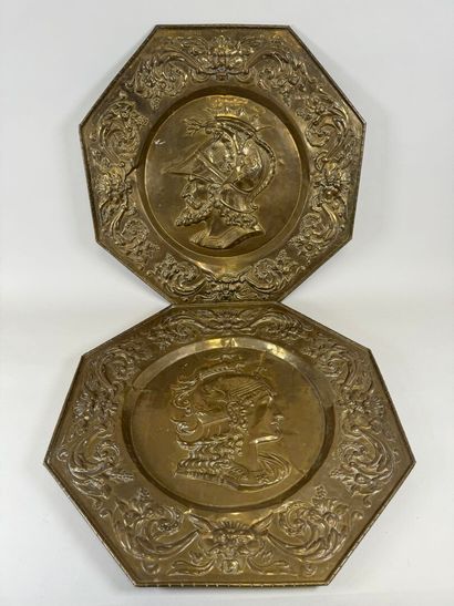 Pair of octagonal repoussé brass dishes with...