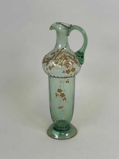 Blown and colored glass pitcher, with gold...
