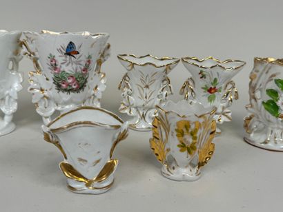 Collection of seven polychrome porcelain...