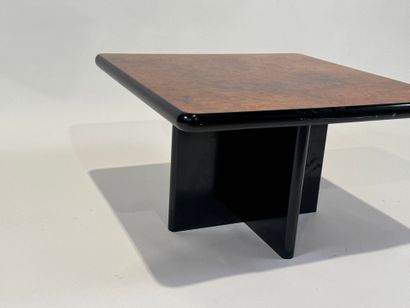 Small square burrwood coffee table, cross-legged.
35...