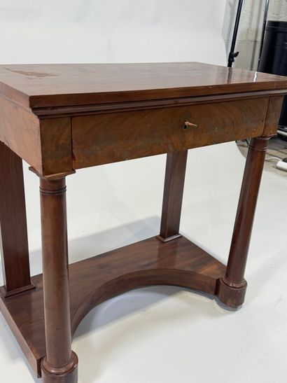 Small console on casters opening to a drawer...