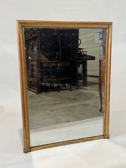 Rectangular glass in wood and gilded stucco.
Late...