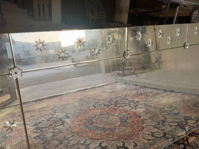 Large rectangular mirror with flower design.
190...