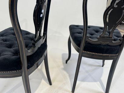 Pair of chairs in blackened wood and burgoté,...