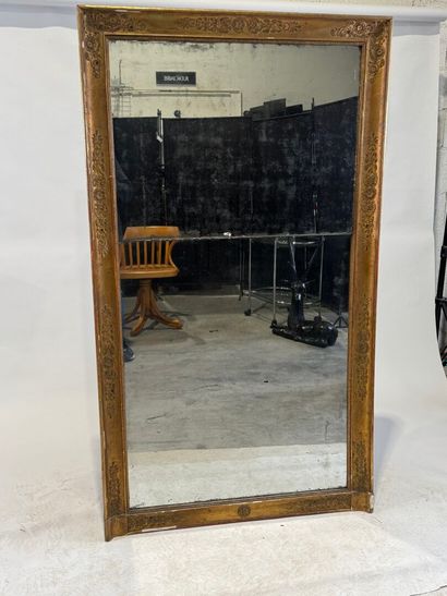 Wood and gilded stucco mirror with foliate...