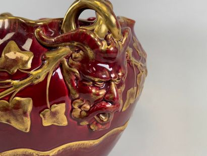 Large earthenware cachepot on a red ground...