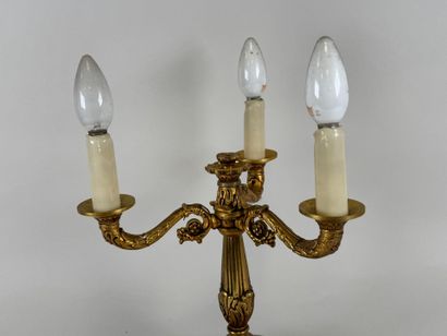 Gilded bronze three-light torch with circular,...