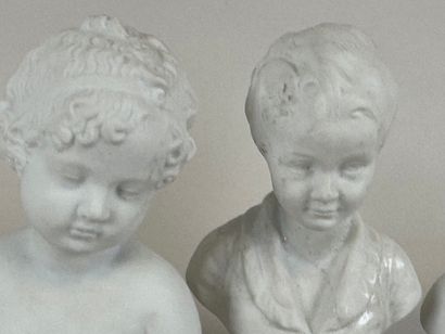 G.L. in Limoges.
Three bisque busts of children,...