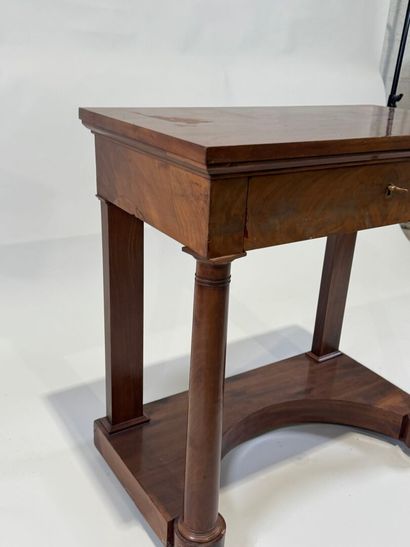 Small console on casters opening to a drawer...